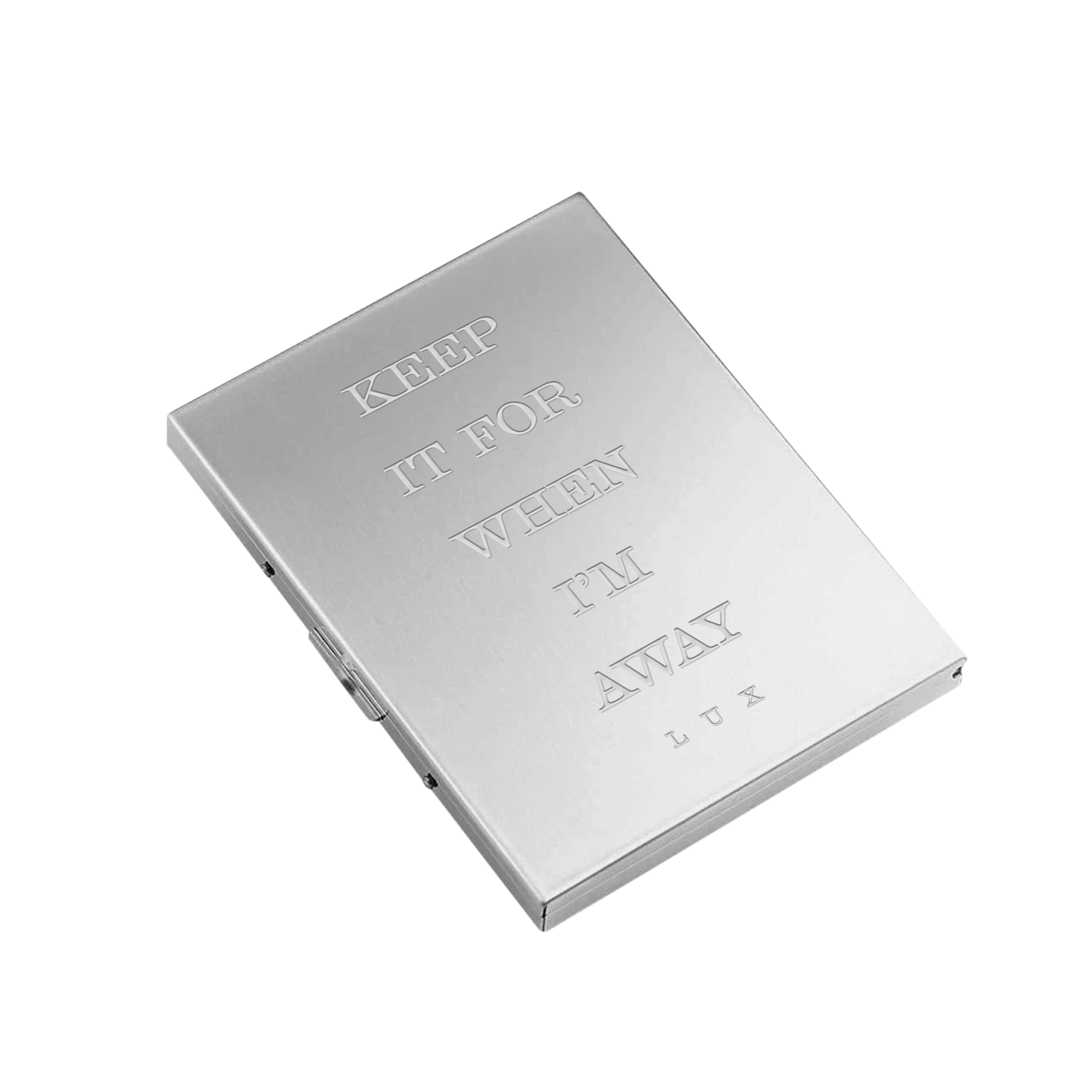 Silver metal box with engraved text reading 'Keep it for when I'm Away - Lux' across the front