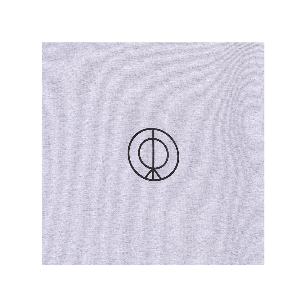 Close-up view of the front of a hoodie featuring a small “LUX” logo printed 